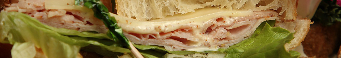 Eating Italian Pizza Sandwich at That's A Some Pizza restaurant in Bainbridge Island, WA.